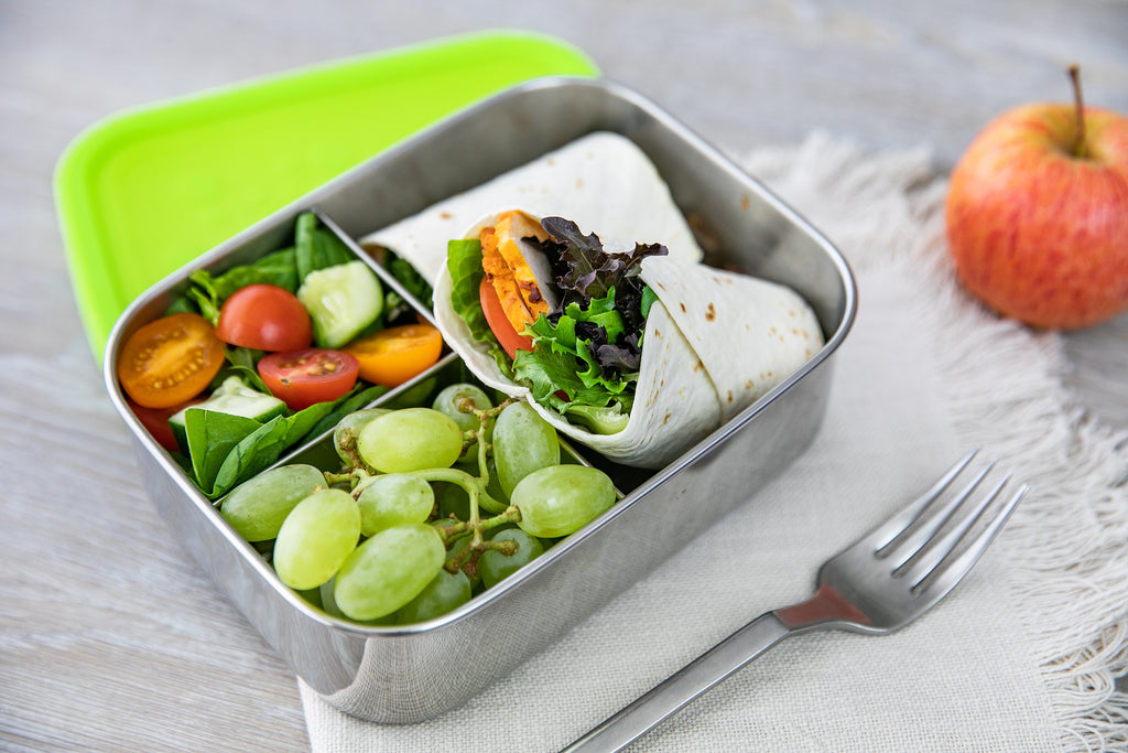 Wrap, grapes and salad in 3 section lunch box