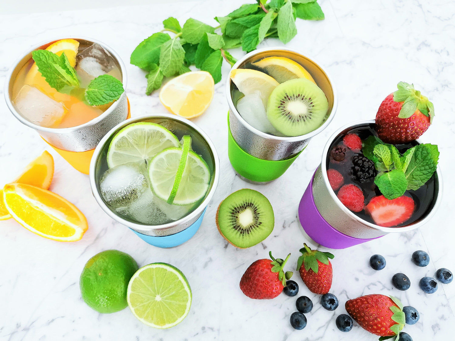 Fruit infused water in stainless steel cups