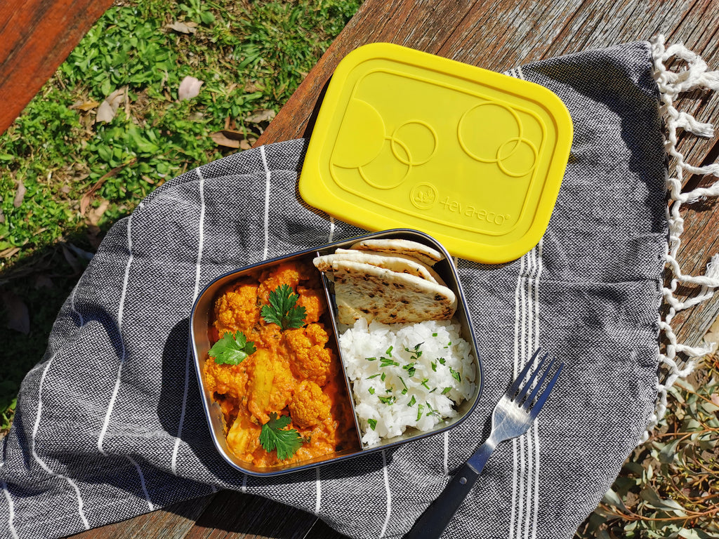 Curry, rice and bread in leakproof stainless steel lunch box