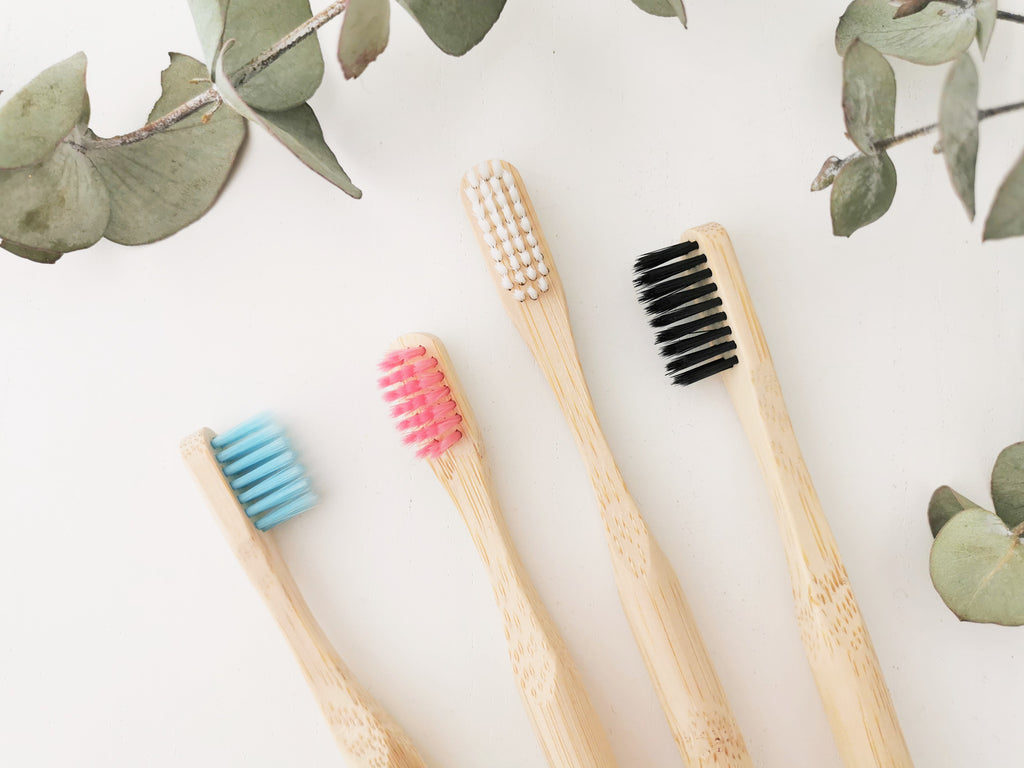 Bamboo toothbrushes bristles charcoal, white, pink and blue
