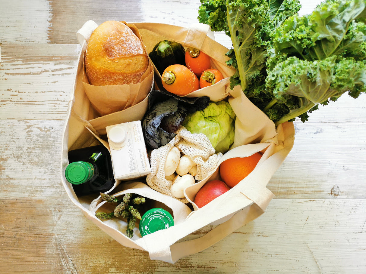 Organic cotton tote bag is large enough to fit a whole basket of shopping.