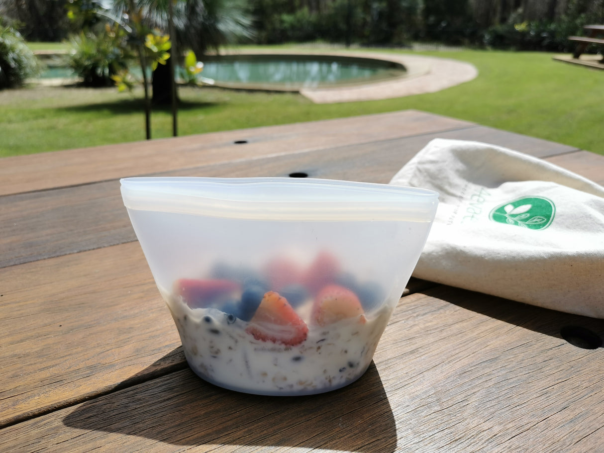 Breakfast cereal and yogurt in a silicone food bag.